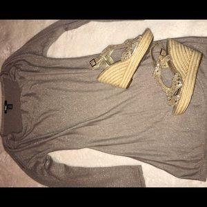 Long sleeve fitted shimmer dress.